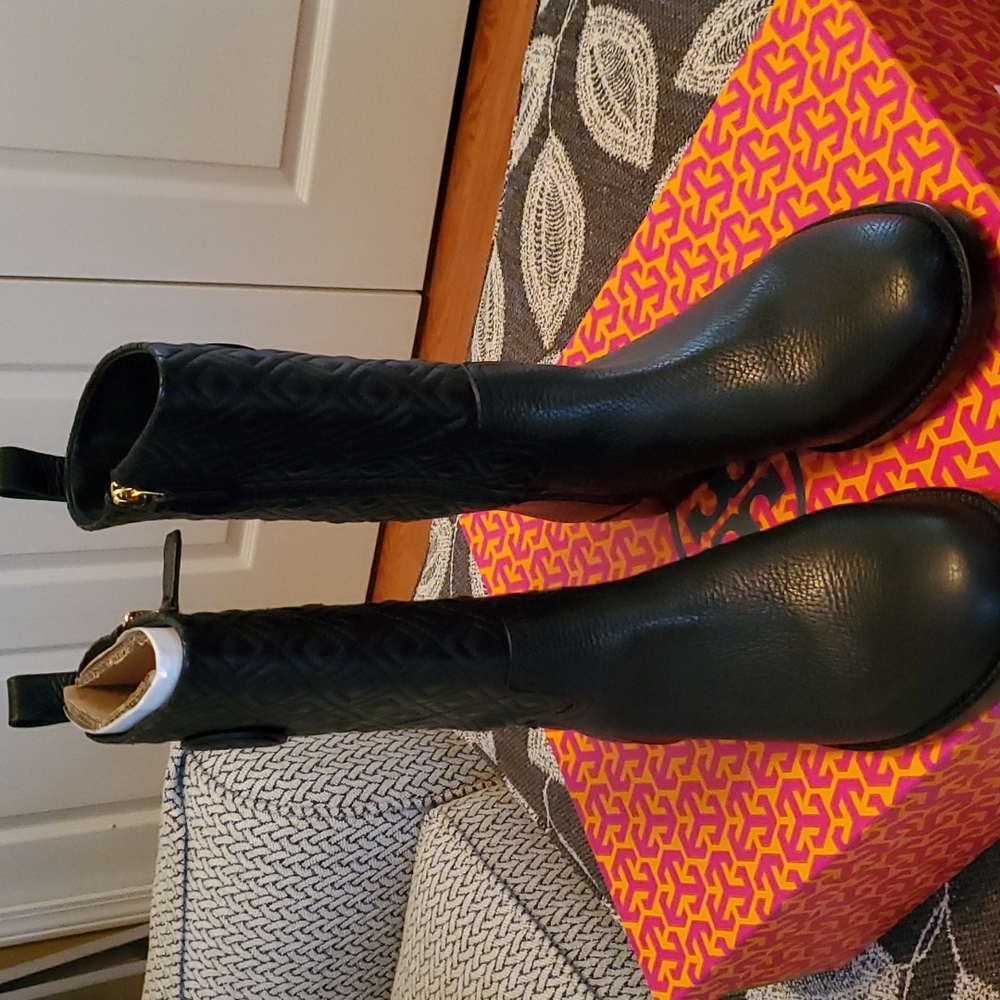 Tory Burch Monogram boots.